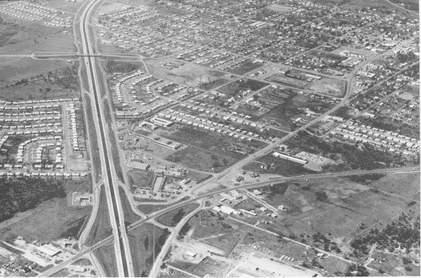 Lewisville in 1965. Scanned from 1965 LHS Yearbook. Looking north on I-35... Lake City USA is the subdivision on the west side of the highway, directly across the highway is Huffines Shopping Center. Fox Avenue is just a dirt trail through the fields on the west side.