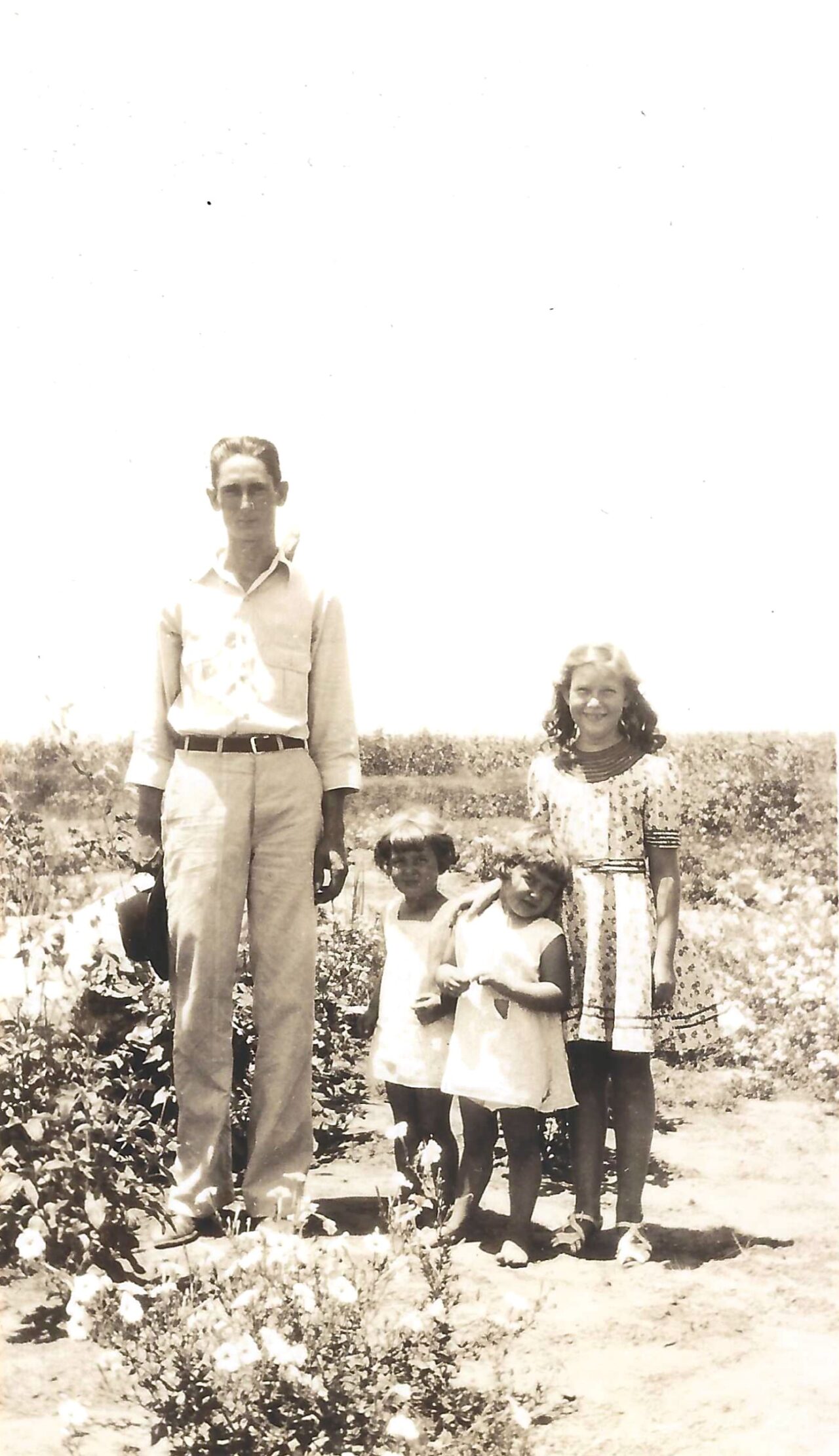 1930s- Russell Twins With Uncle and Cousin (front)